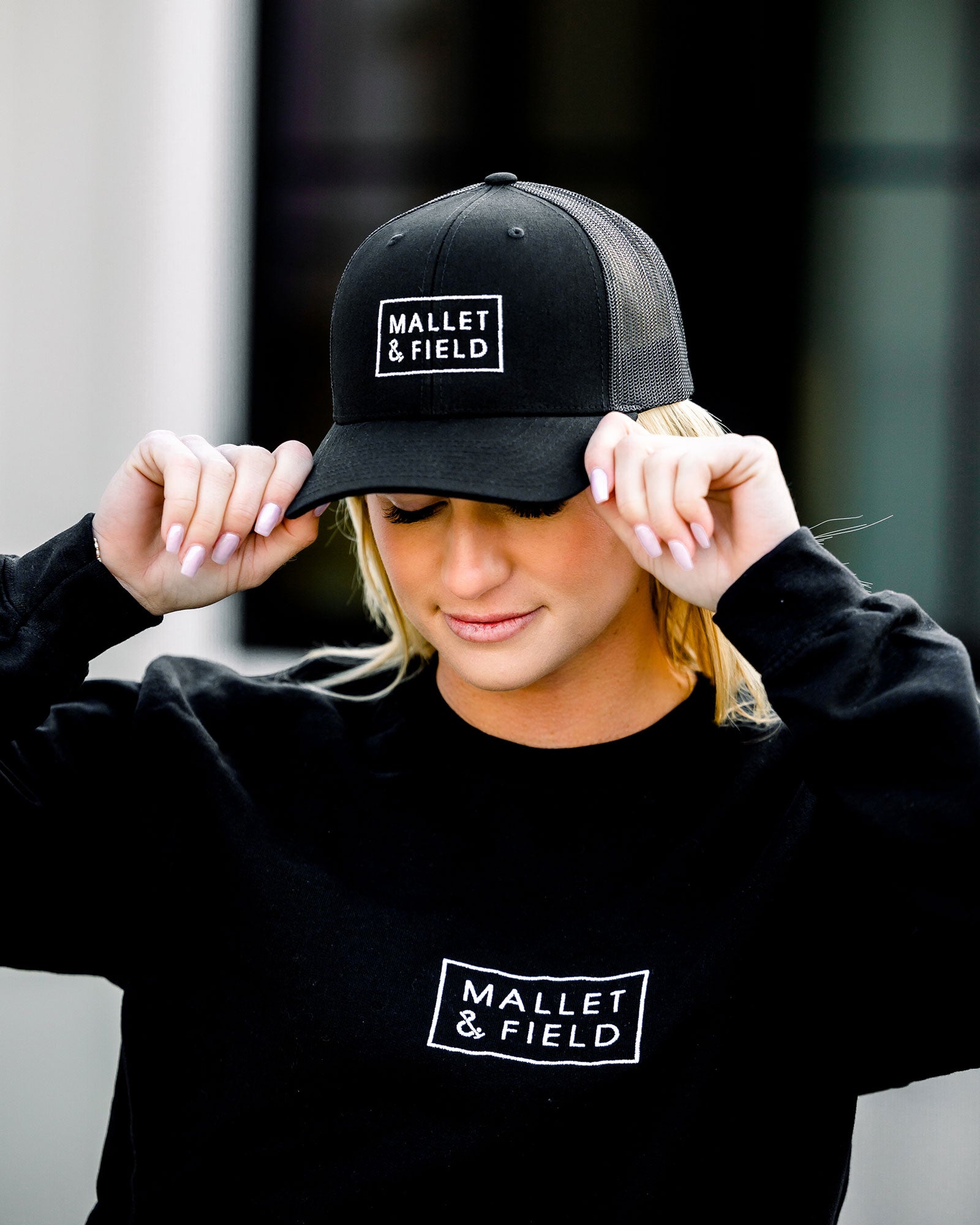 Mallet-and-Field-field-logo-embroidered-trucker-hat-black-lifestyle-01.jpg